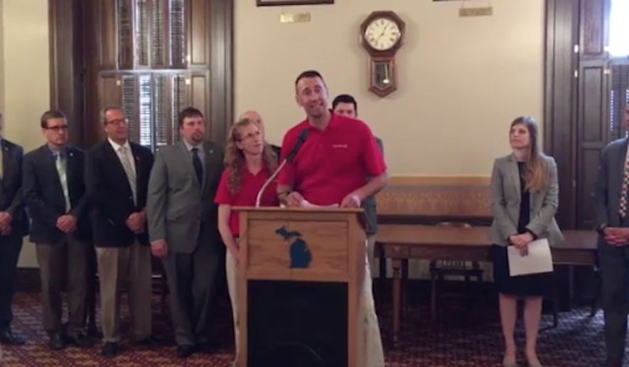 Steve Tennes, owner of Country Mill Farms, speaks at a press conference.